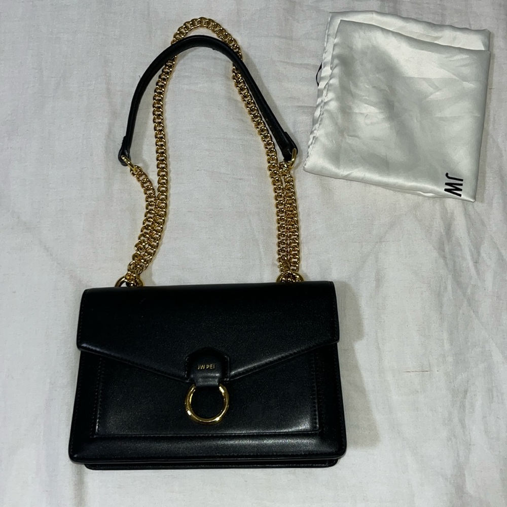 JW PEI purse, black in excellent condition. Only used a couple of times